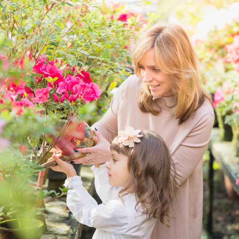 mum and young daughter in garden -therachange.co.uk